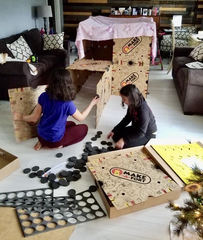 2 girls building